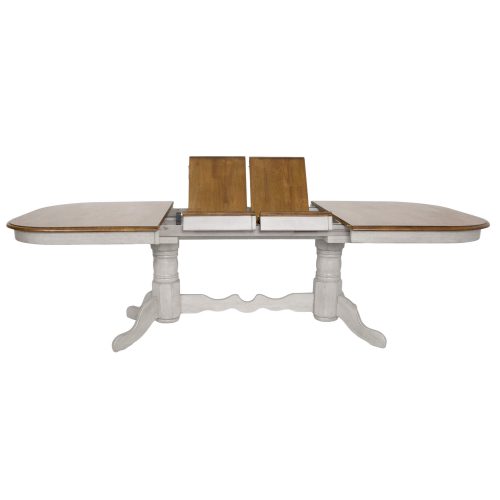 Country Grove Collection - Double Pedestal Extendable Dining Table showing butterfly leafs DLU-CG4296-GO