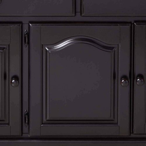 Black Cherry Selections - Treasure buffet and lighted hutch in Antique black finish with Cherry accents - detail of buffet door DLU-22-BH-BCH